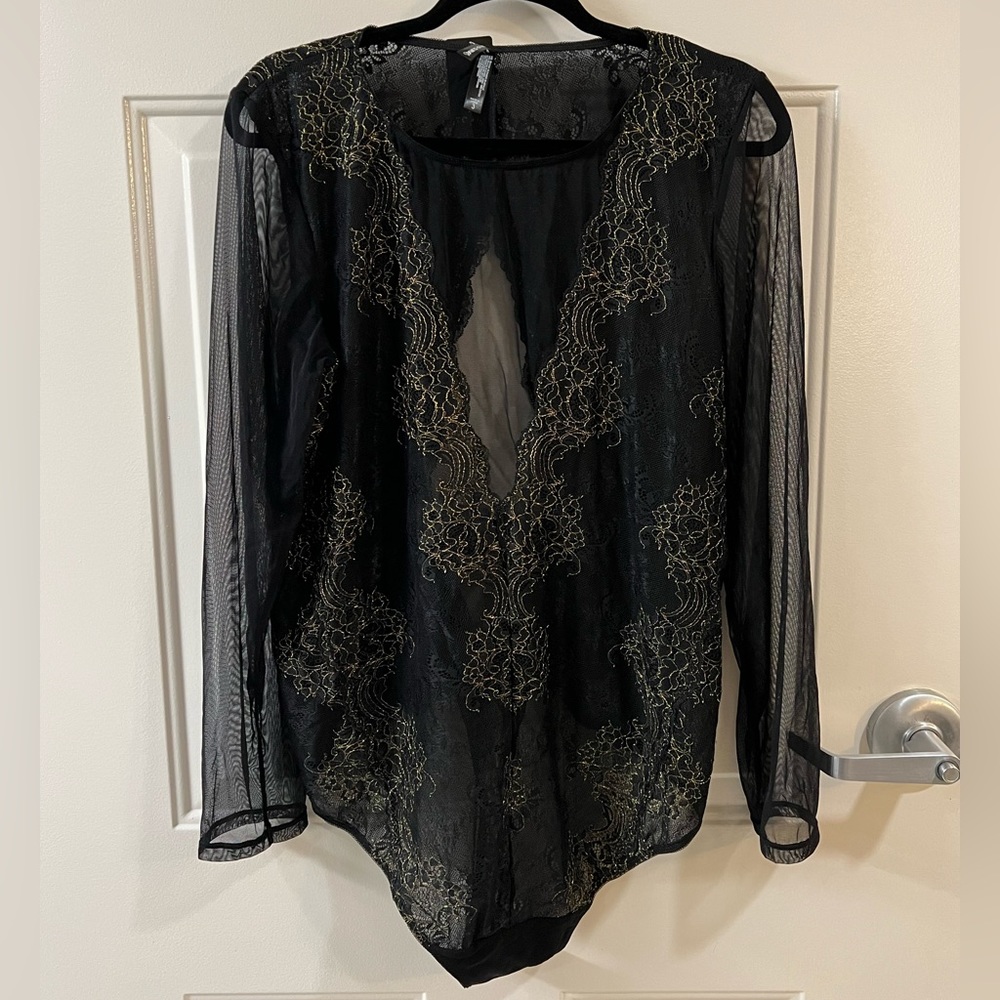 NWT Torrid black and gold mesh thong bodysuit